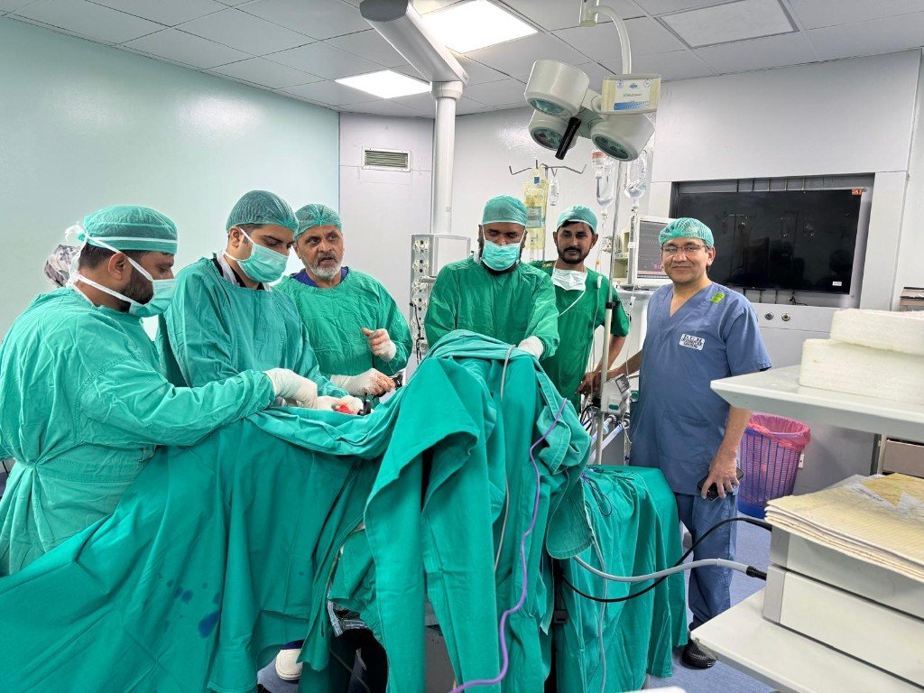 Surgical team performing colorectal procedure